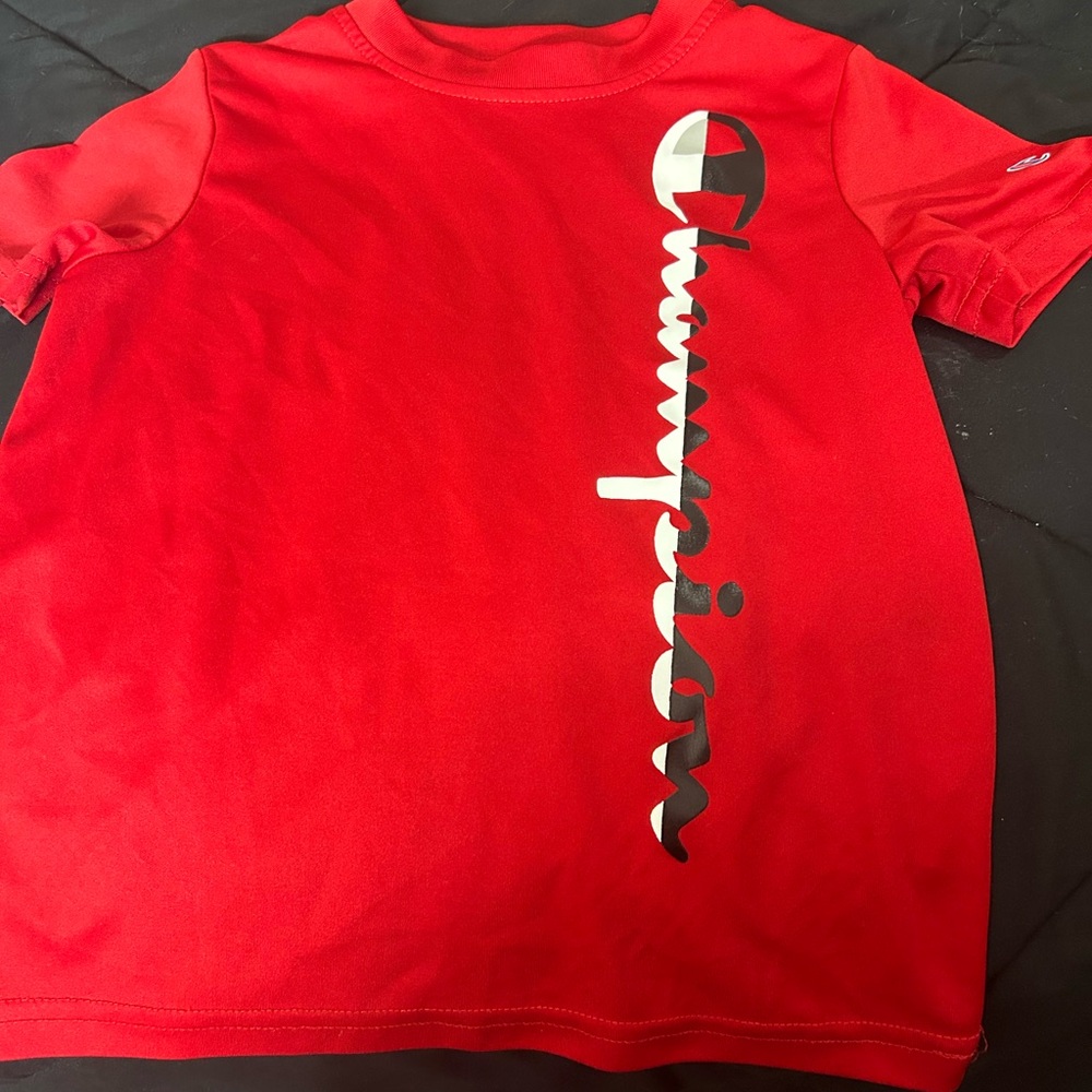 Boys red champions shirt size 4/5